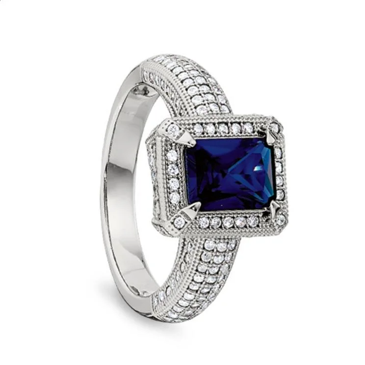 Rings Vibe Tutorials-Emerald Cut Synthetic Blue Sapphire Women's Ring with Simulated Diamonds