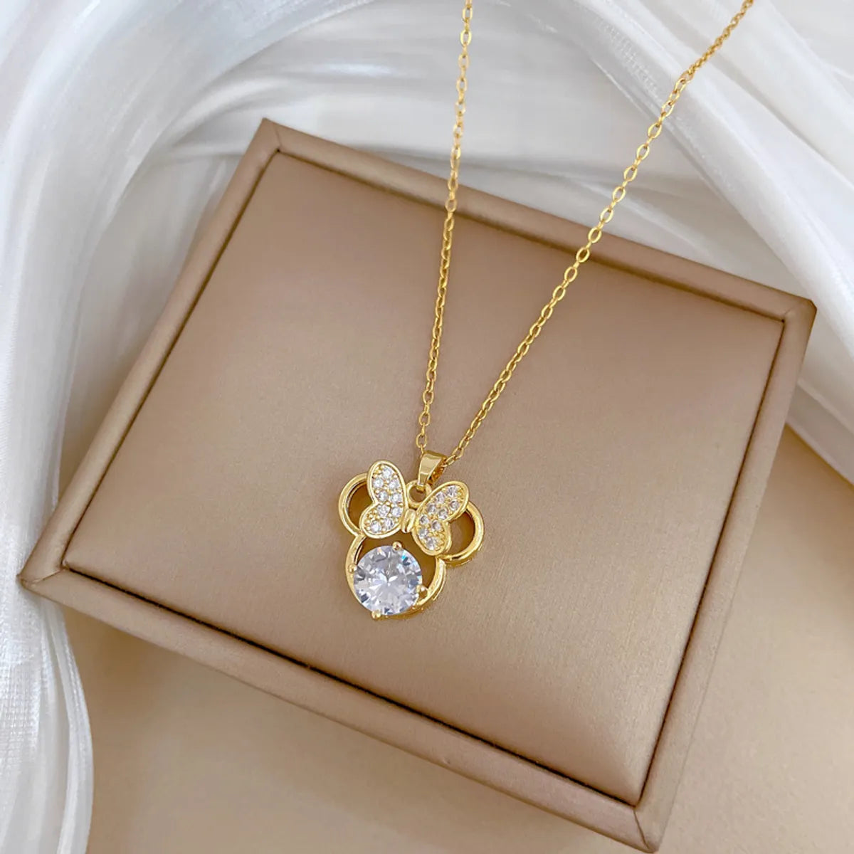 Necklaces With Spiral Designs-Titanium Steel Copper Gold Plated Inlay Bow Knot Zircon Pendant Necklace